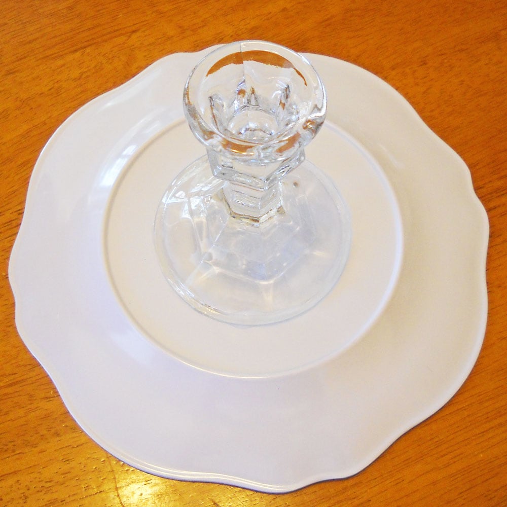 attach candlestick to underside of plate