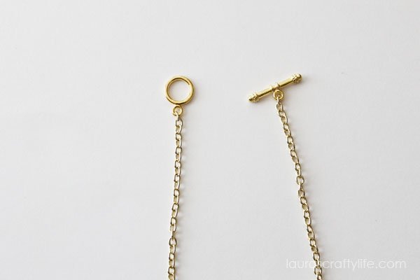 Attach toggle to ends of gold chain
