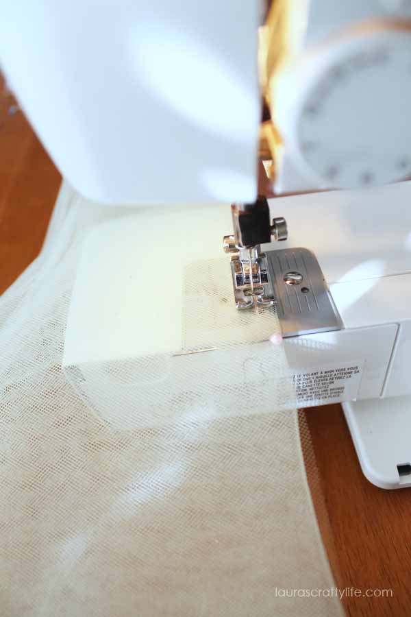 Use sewing machine to baste tulle