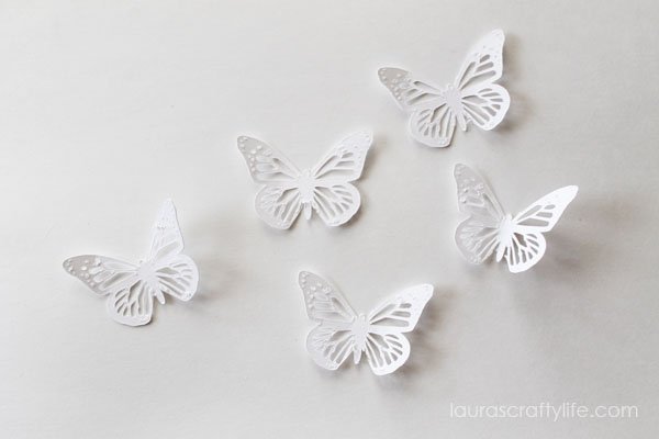 Cut out butterfly shapes using the Cricut Explore