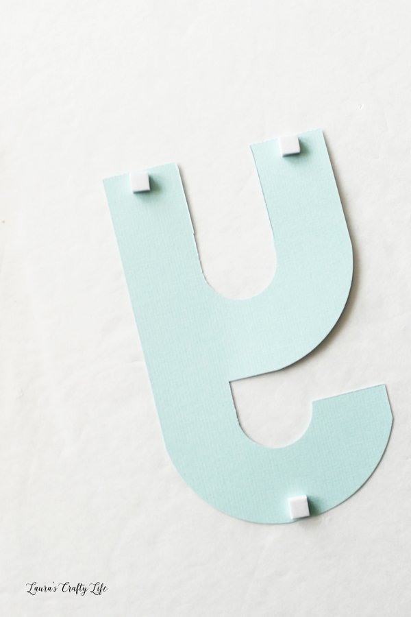 add-adhesive-foam-squares-to-letters-to-attach-to-banner