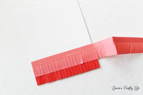 alternate-layers-of-pink-and-red-fringe-tape