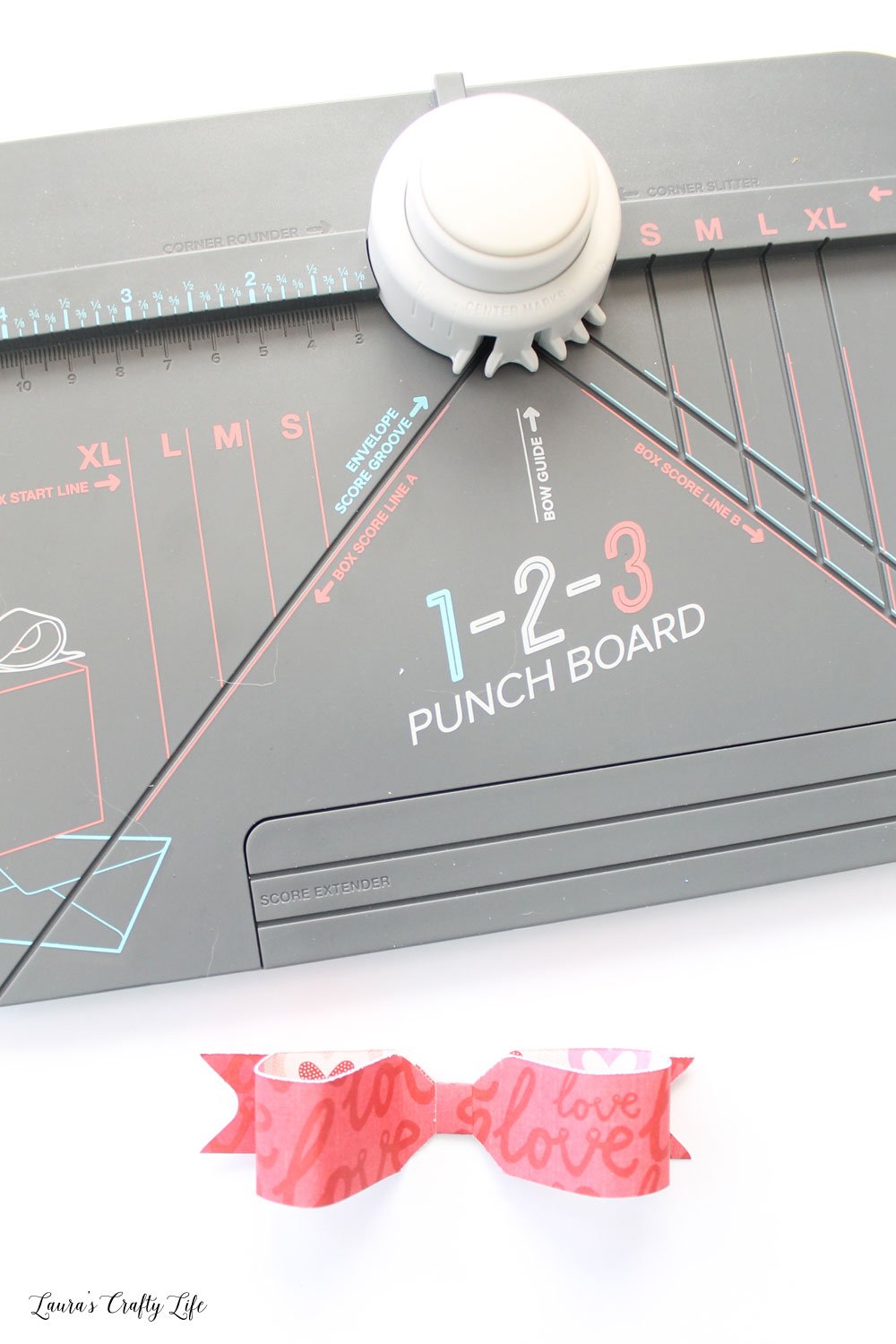 Use the 1-2-3 punch board to create a paper bow